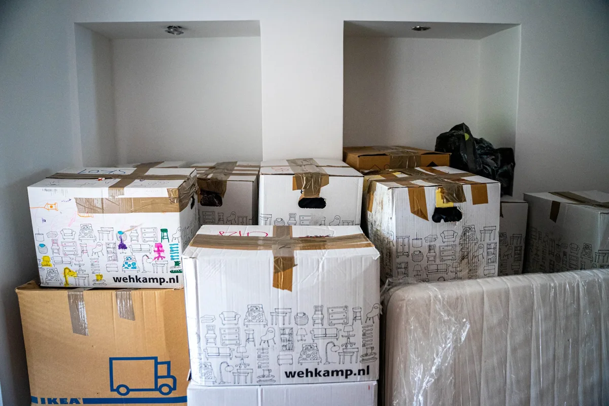Moving boxes in a bright room